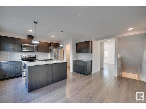 #24 2215 24 St Nw, Edmonton, AB - Indoor Photo Showing Kitchen With Stainless Steel Kitchen