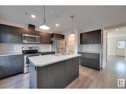 #24 2215 24 St Nw, Edmonton, AB - Indoor Photo Showing Kitchen With Stainless Steel Kitchen With Upgraded Kitchen