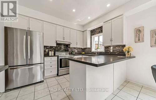 11 Tom Edwards Drive, Whitby, ON - Indoor Photo Showing Kitchen With Upgraded Kitchen