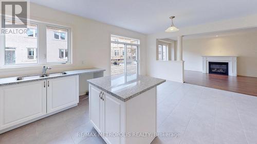 72 Donald Stewart Road, Brampton, ON - Indoor Photo Showing Kitchen With Fireplace With Double Sink