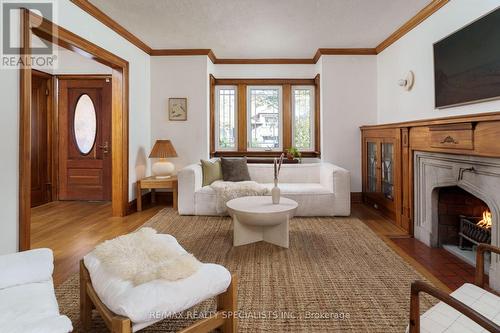 28 Eleventh Street, Toronto, ON - Indoor Photo Showing Living Room With Fireplace