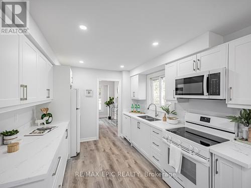 6759 Segovia Road, Mississauga, ON - Indoor Photo Showing Kitchen With Double Sink