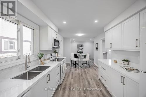 6759 Segovia Road, Mississauga, ON - Indoor Photo Showing Kitchen With Double Sink With Upgraded Kitchen