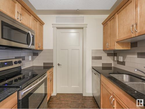 #303 16235 51 St Nw Nw, Edmonton, AB - Indoor Photo Showing Kitchen