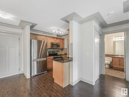 #303 16235 51 St Nw Nw, Edmonton, AB - Indoor Photo Showing Kitchen With Stainless Steel Kitchen