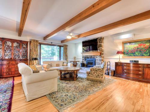 Salon - 301 Ch. Éloi, Piedmont, QC - Indoor Photo Showing Living Room With Fireplace