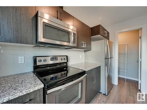 #7 2215 24 St Nw, Edmonton, AB - Indoor Photo Showing Kitchen With Stainless Steel Kitchen