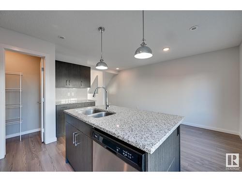 #7 2215 24 St Nw, Edmonton, AB - Indoor Photo Showing Kitchen With Double Sink With Upgraded Kitchen