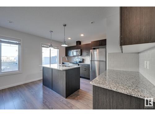 #7 2215 24 St Nw, Edmonton, AB - Indoor Photo Showing Kitchen With Stainless Steel Kitchen With Upgraded Kitchen