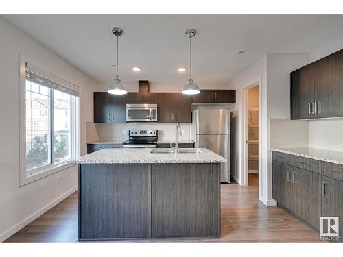 #7 2215 24 St Nw, Edmonton, AB - Indoor Photo Showing Kitchen With Stainless Steel Kitchen With Upgraded Kitchen