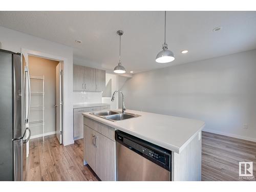 #6 2215 24 St Nw, Edmonton, AB - Indoor Photo Showing Kitchen With Stainless Steel Kitchen With Double Sink