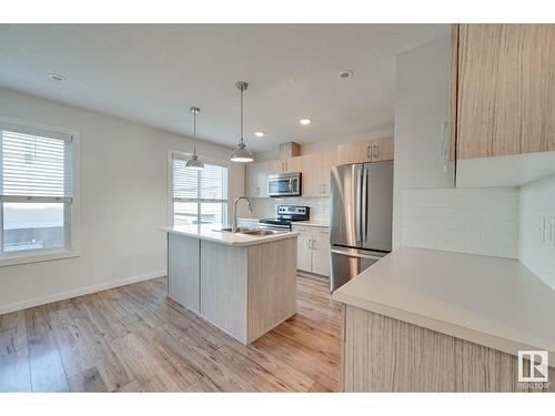 #6 2215 24 St Nw, Edmonton, AB - Indoor Photo Showing Kitchen With Stainless Steel Kitchen