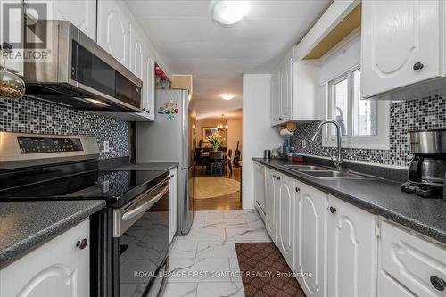 3 Green Glade Court, Innisfil, ON - Indoor Photo Showing Kitchen With Double Sink