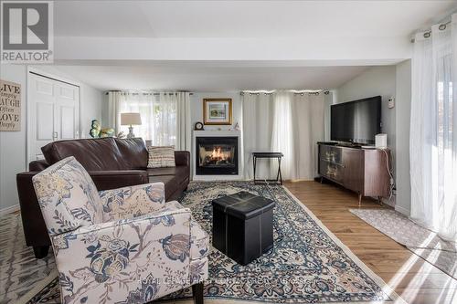 3 Green Glade Court, Innisfil, ON - Indoor Photo Showing Living Room With Fireplace