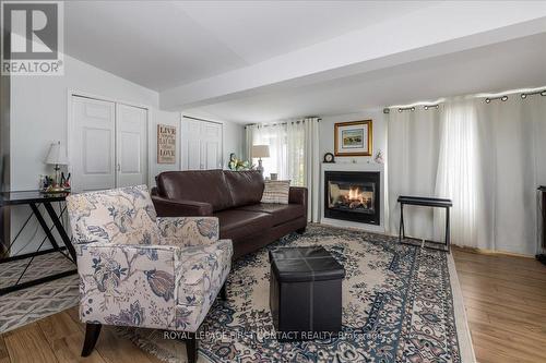 3 Green Glade Court, Innisfil, ON - Indoor Photo Showing Living Room With Fireplace