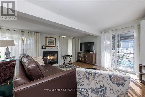 3 Green Glade Court, Innisfil, ON - Indoor Photo Showing Living Room With Fireplace