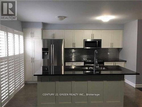 1048 Haxton Heights, Milton, ON - Indoor Photo Showing Kitchen