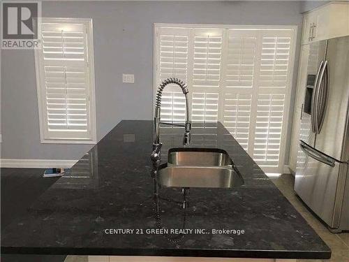 1048 Haxton Heights, Milton, ON - Indoor Photo Showing Kitchen With Stainless Steel Kitchen With Double Sink