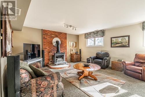 1908 10Th Line, Innisfil, ON - Indoor Photo Showing Living Room With Fireplace