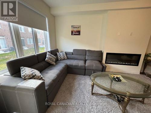 19 Donald Ficht Crescent, Brampton, ON - Indoor Photo Showing Living Room With Fireplace