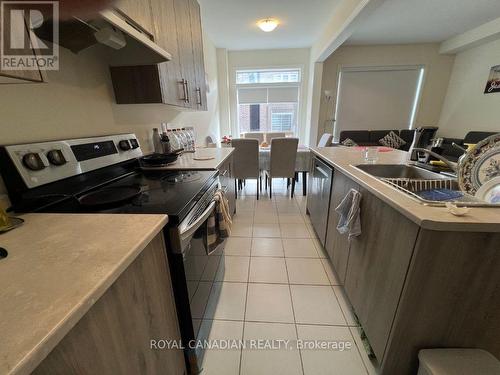 19 Donald Ficht Crescent, Brampton, ON - Indoor Photo Showing Kitchen With Double Sink