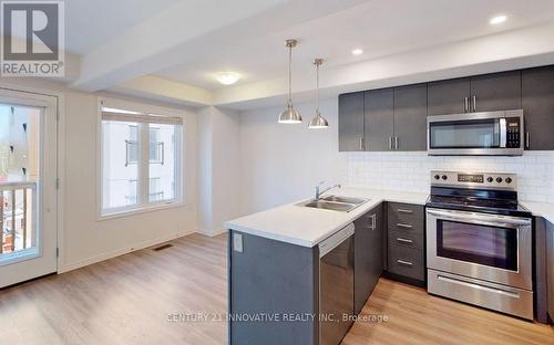 1634 Hetherington Drive W, Peterborough, ON - Indoor Photo Showing Kitchen With Stainless Steel Kitchen With Double Sink With Upgraded Kitchen