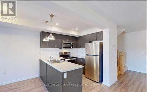 1634 Hetherington Drive W, Peterborough, ON - Indoor Photo Showing Kitchen With Stainless Steel Kitchen With Double Sink With Upgraded Kitchen