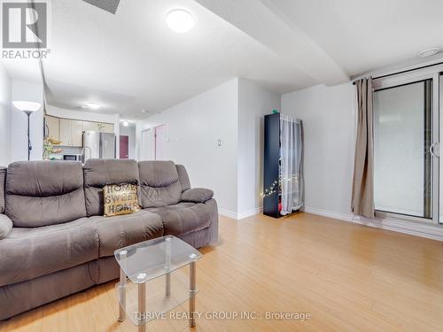 309 - 7405 Goreway Drive, Mississauga (Malton), ON - Indoor Photo Showing Living Room