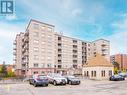 Ample Above Ground Visitor Parking - 309 - 7405 Goreway Drive, Mississauga (Malton), ON  - Outdoor With Balcony With Facade 