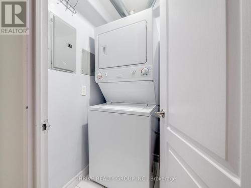 Ensuite Laundry - 309 - 7405 Goreway Drive, Mississauga (Malton), ON - Indoor Photo Showing Laundry Room