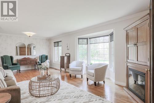 140 Louisa Street, Kawartha Lakes (Fenelon Falls), ON - Indoor Photo Showing Living Room With Fireplace