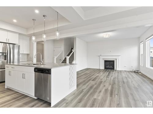 1635 16 St Nw, Edmonton, AB - Indoor Photo Showing Kitchen With Fireplace With Upgraded Kitchen