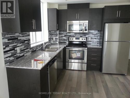 908 - 9506 Markham Road, Markham, ON - Indoor Photo Showing Kitchen With Double Sink With Upgraded Kitchen