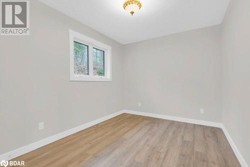 Empty room with light wood-type flooring - 530 Addington Road 5, Cloyne, ON - Indoor Photo Showing Other Room