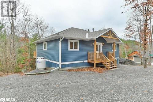 View of front of home featuring a garage - 530 Addington Road 5, Cloyne, ON - Outdoor