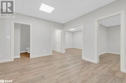 Empty room featuring light hardwood / wood-style floors - 