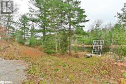 View of yard with a water view - 