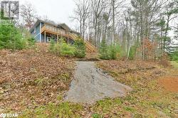 View of yard featuring a deck - 