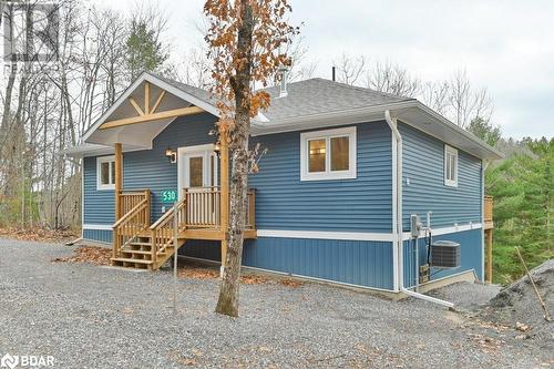 View of front of house with cooling unit - 530 Addington Road 5, Cloyne, ON - Outdoor