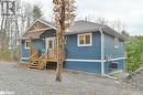 View of front of house with cooling unit - 530 Addington Road 5, Cloyne, ON  - Outdoor 