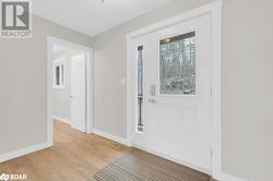 Entryway featuring light wood-type flooring - 