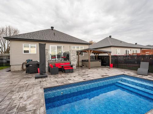 Face arriÃ¨re - 93 Rue Joseph-Albert-Morin, Saint-Jean-Sur-Richelieu, QC - Outdoor With In Ground Pool With Deck Patio Veranda