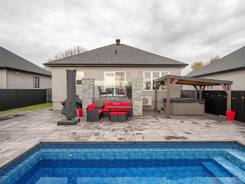 Face arriÃ¨re - 93 Rue Joseph-Albert-Morin, Saint-Jean-Sur-Richelieu, QC - Outdoor With In Ground Pool With Deck Patio Veranda