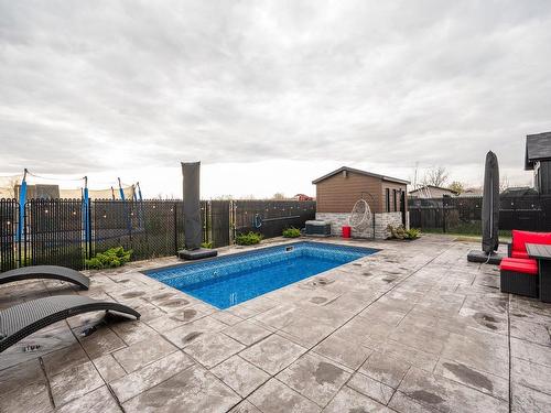 Vue d'ensemble - 93 Rue Joseph-Albert-Morin, Saint-Jean-Sur-Richelieu, QC - Outdoor With In Ground Pool With Backyard