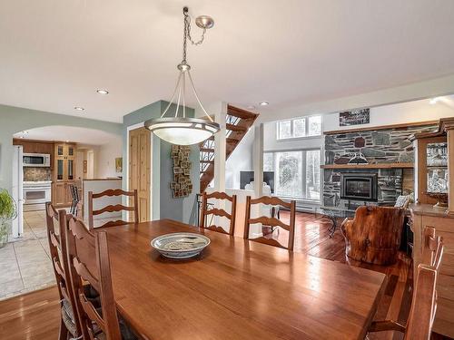 Salle Ã  manger - 375 Rue Des Libellules, Saint-Colomban, QC - Indoor Photo Showing Dining Room With Fireplace