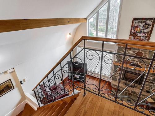 Escalier - 375 Rue Des Libellules, Saint-Colomban, QC - Indoor Photo Showing Other Room With Fireplace