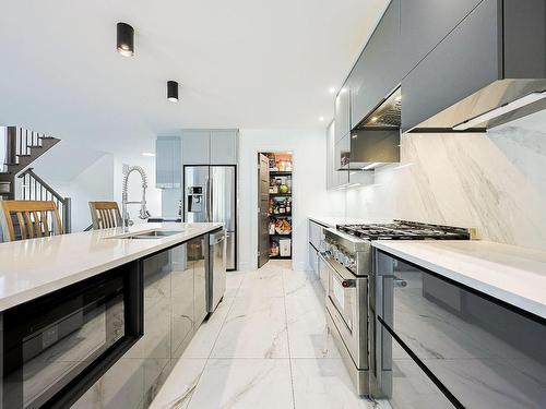 Cuisine - 11915 Rue Du Cuivre, Mirabel, QC - Indoor Photo Showing Kitchen With Double Sink With Upgraded Kitchen