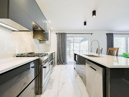 Cuisine - 11915 Rue Du Cuivre, Mirabel, QC - Indoor Photo Showing Kitchen With Double Sink With Upgraded Kitchen