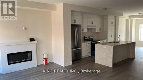 13 Heathrow Lane E, Caledon, ON - Indoor Photo Showing Other Room With Fireplace