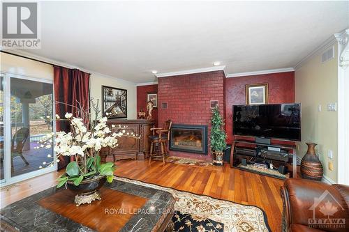 1100 Moffatt Drive, Ottawa, ON - Indoor Photo Showing Living Room With Fireplace